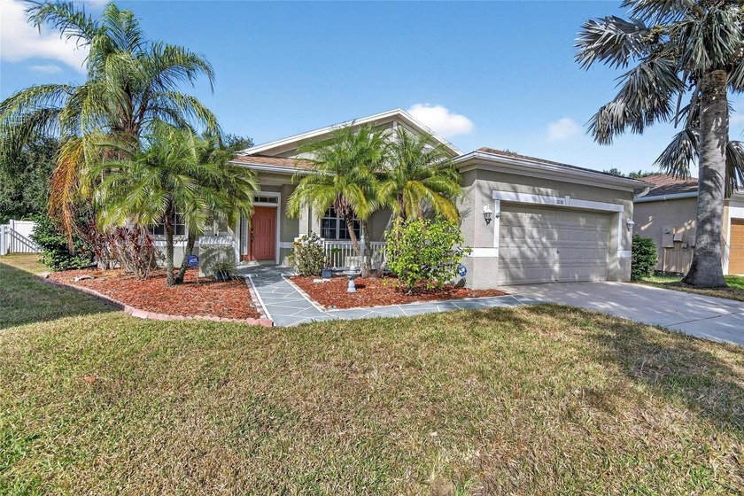 Welcome to this stunning Riverview residence, a beautifully - Beach Home for sale in Riverview, Florida on Beachhouse.com