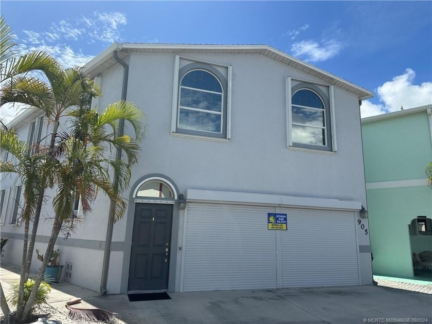 WELCOME TO PARADISE! 3 LARGE BEDROOM, 2 1/2 BATHS FRAMED STUCCO - Beach Home for sale in Jensen Beach, Florida on Beachhouse.com