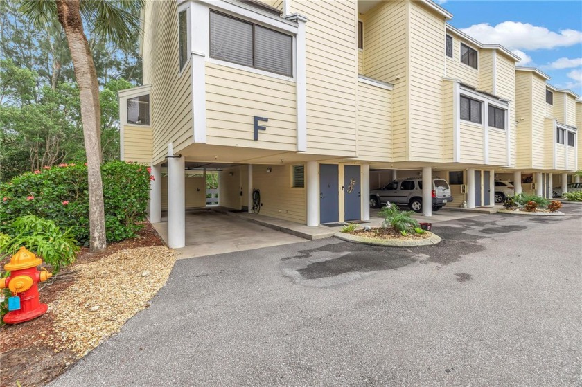 Welcome to the pinnacle of coastal living at 1500 Sunset Rd F1! - Beach Townhome/Townhouse for sale in Tarpon Springs, Florida on Beachhouse.com