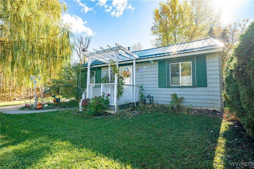 Move right into this adorable home-packed with upgrades and full - Beach Home for sale in Angola, New York on Beachhouse.com