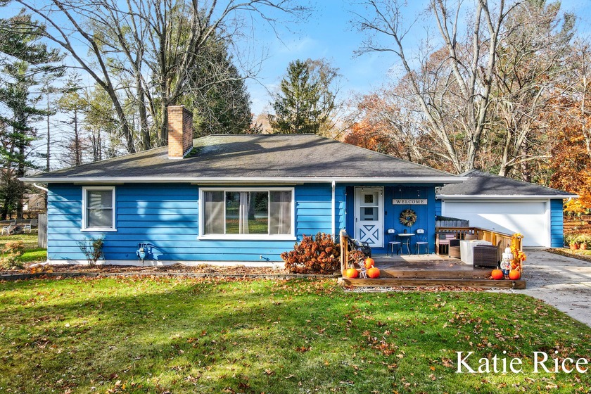 Say hello to this adorable ranch just a stones throw from Bear - Beach Home for sale in Muskegon, Michigan on Beachhouse.com