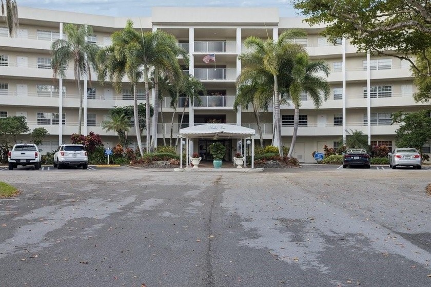 2-bed, 2-bath golf-view condo in the desirable all-ages Palm - Beach Condo for sale in Pompano Beach, Florida on Beachhouse.com