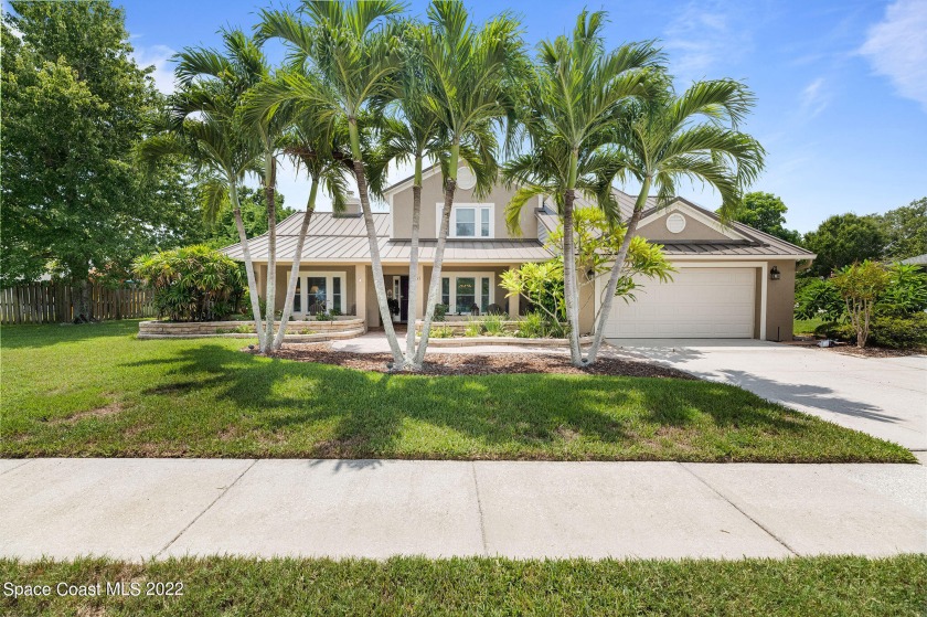 Take a look at that curb appeal! The exterior of this two-story - Beach Home for sale in Merritt Island, Florida on Beachhouse.com