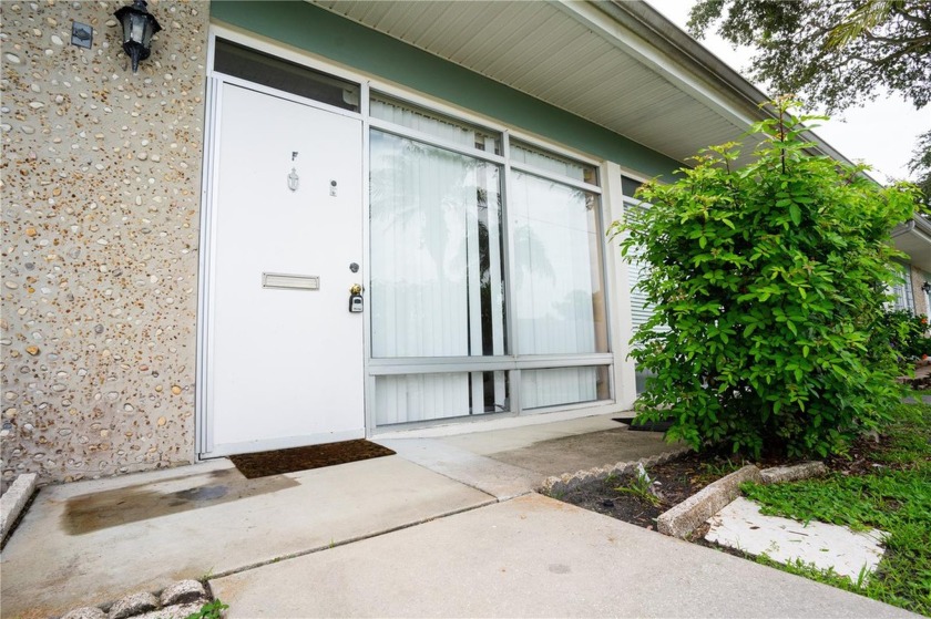 Two-bedroom, condominium boasts an open floor plan bathed in - Beach Condo for sale in Holiday, Florida on Beachhouse.com