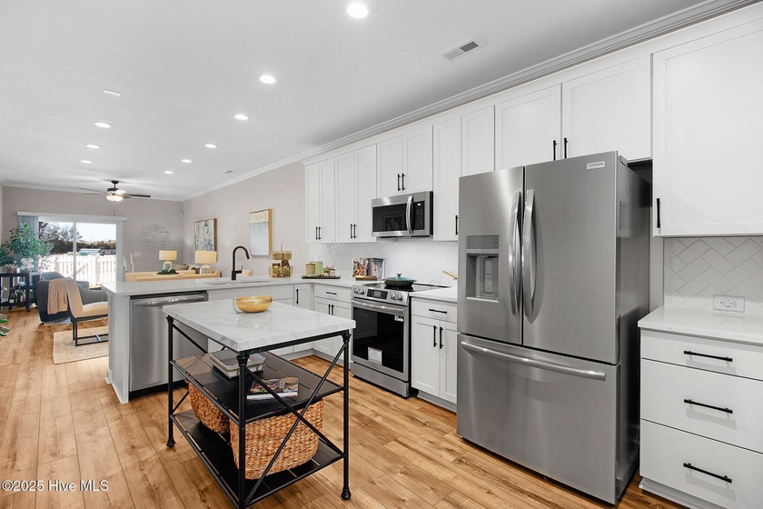 At 1984 square feet with a first-floor master and wide footprint - Beach Townhome/Townhouse for sale in Beaufort, North Carolina on Beachhouse.com