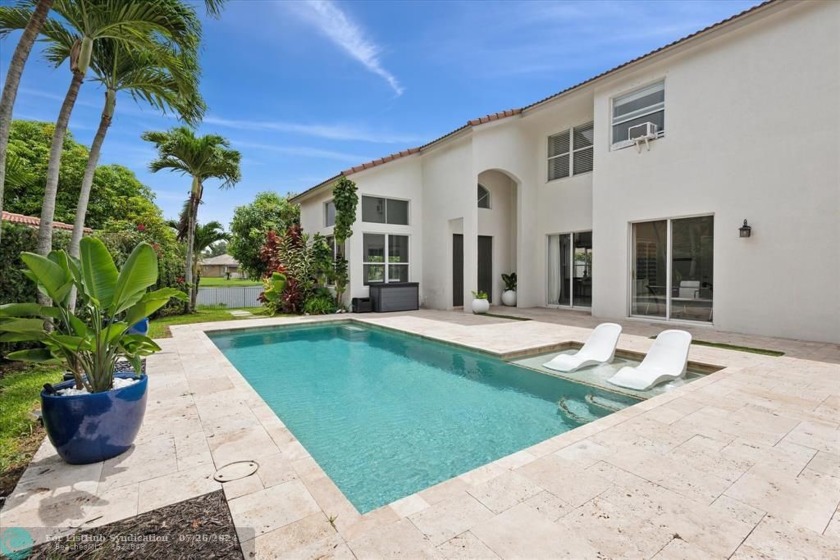 Step into your private courtyard home with 6 bedrooms and 4 - Beach Home for sale in Miramar, Florida on Beachhouse.com