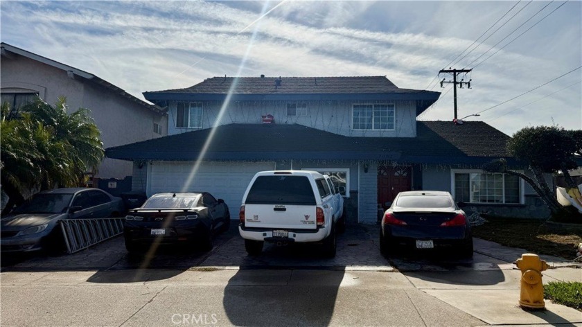 Fantastic opportunity to own a spacious 6 bedroom, 3 bath, 2 car - Beach Home for sale in Huntington Beach, California on Beachhouse.com