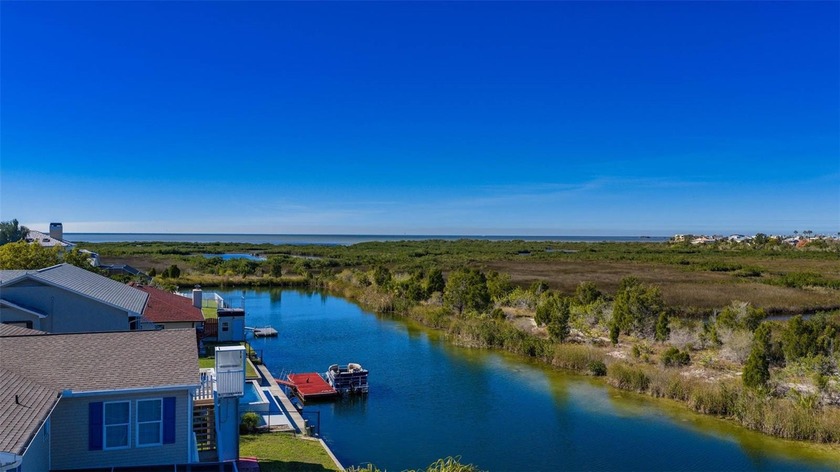 Stunning Pink Three-Story Octagon Home with Preserve & Gulf - Beach Home for sale in Hernando Beach, Florida on Beachhouse.com