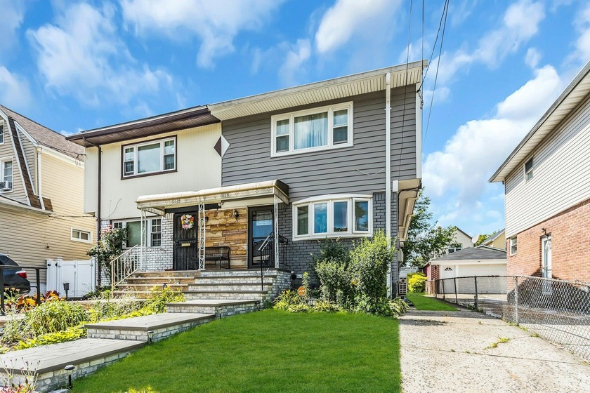 Welcome to this spacious 3-bedroom, 2-bath single-family - Beach Home for sale in Jamaica, New York on Beachhouse.com