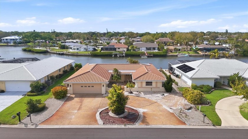 Live the ultimate Florida waterfront lifestyle on Forked Creek! - Beach Home for sale in Englewood, Florida on Beachhouse.com