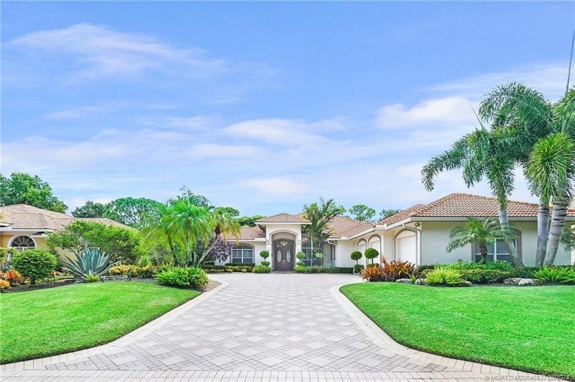 Private setting in Cypress Glen neighborhood on 7th fairway of - Beach Home for sale in Stuart, Florida on Beachhouse.com