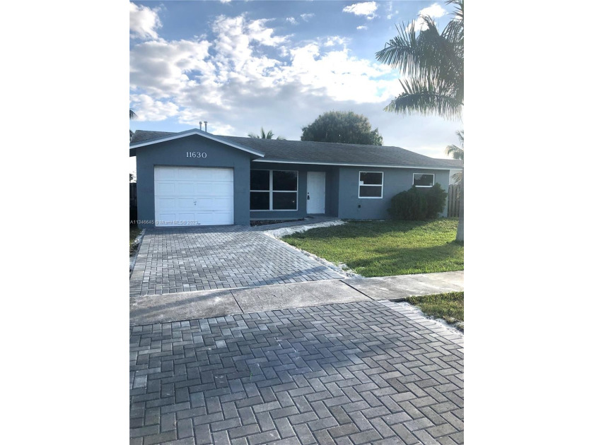 New Renovated 3 bedrooms, 2 baths single house with lake view - Beach Home for sale in Sunrise, Florida on Beachhouse.com
