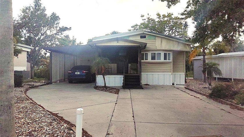 This home is right on Sugar Creek with a gorgeous view of the - Beach Home for sale in Bradenton, Florida on Beachhouse.com