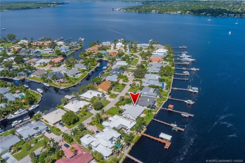 Welcome to your waterfront dream home! This exquisite property - Beach Home for sale in Palm City, Florida on Beachhouse.com