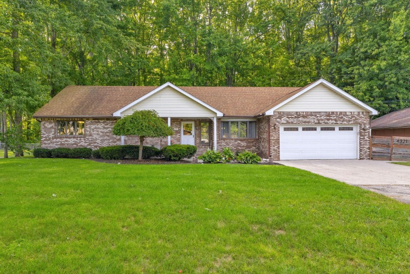 Welcome to this move-in ready, expansive brick ranch on a - Beach Home for sale in Fort Gratiot, Michigan on Beachhouse.com