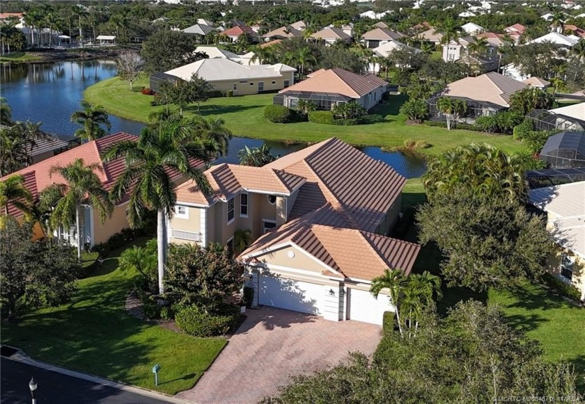 Serene lake views and elegant living in prestigious River Wind - Beach Home for sale in Vero Beach, Florida on Beachhouse.com