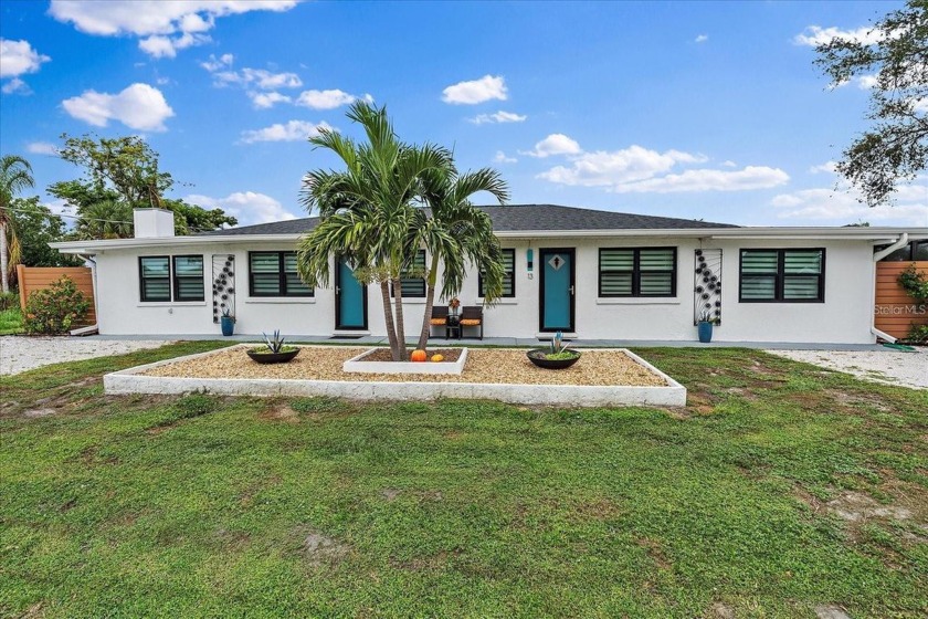 Welcome home! Step into this sun-drenched sanctuary, where - Beach Home for sale in Nokomis, Florida on Beachhouse.com