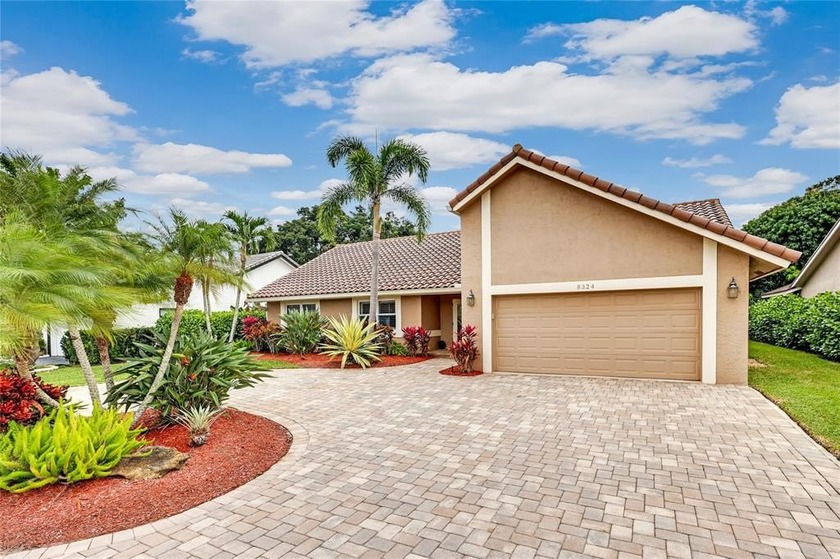 Rarely available single family home in Oaks @ Woodmont with NO - Beach Home for sale in Tamarac, Florida on Beachhouse.com