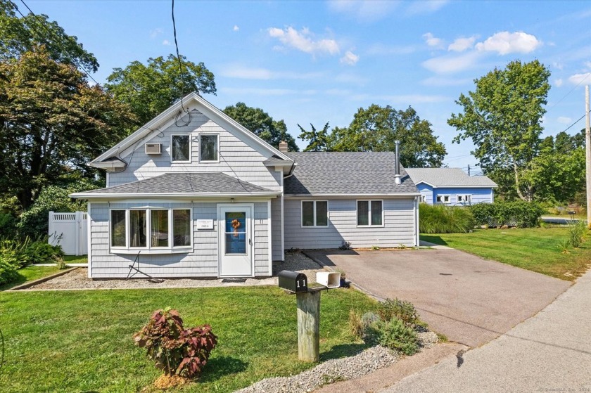 Desirable Lords Point water community features a charming Cape - Beach Home for sale in Stonington, Connecticut on Beachhouse.com