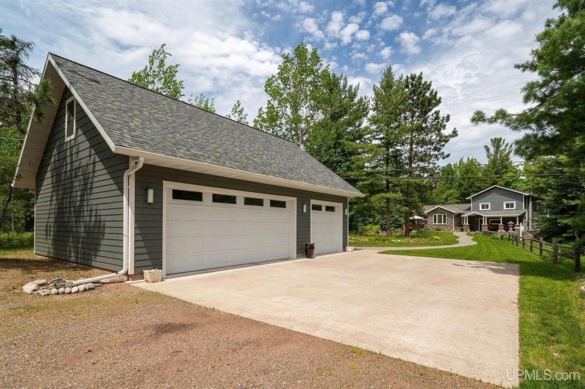 Nestled on the tranquil shores of Lake Superior lies a - Beach Home for sale in Marquette, Michigan on Beachhouse.com