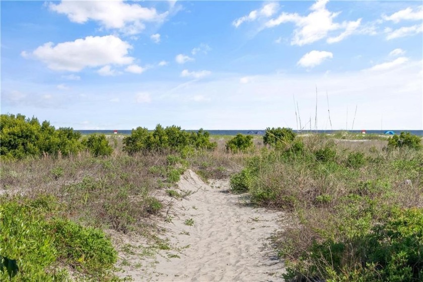 Discover the epitome of coastal living in this fully renovated - Beach Condo for sale in Saint Simons, Georgia on Beachhouse.com