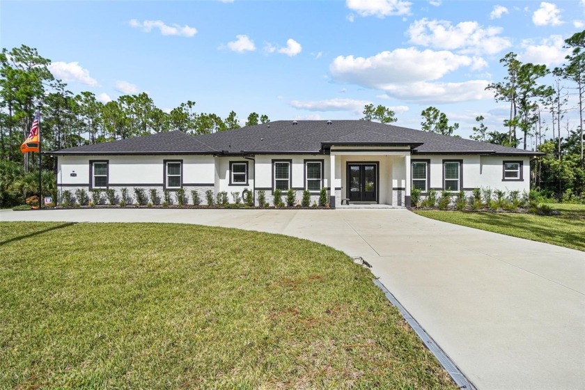 Welcome to this stunning 5-bedroom, 4-bathroom custom-built home - Beach Home for sale in Mims, Florida on Beachhouse.com