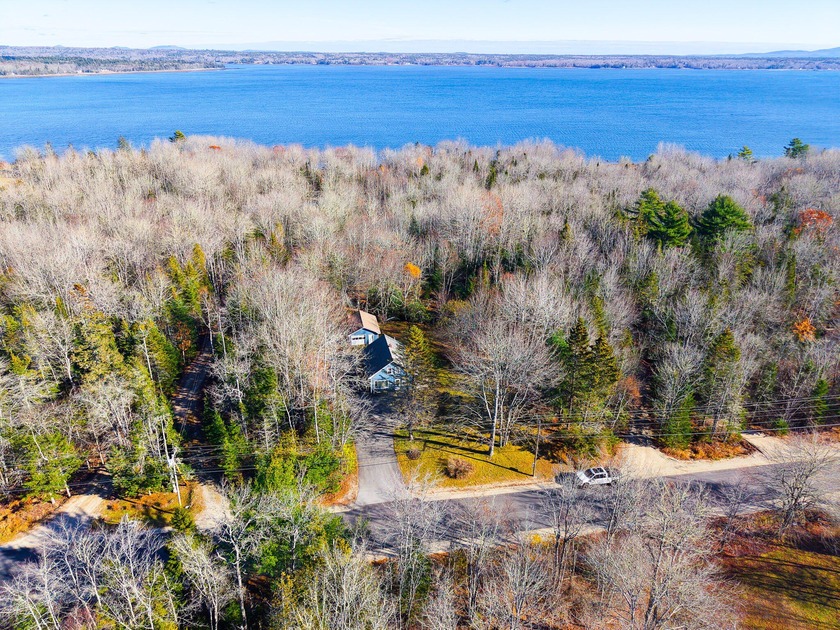 Set on a private lot with a spacious lawn and a desirable garage - Beach Home for sale in Surry, Maine on Beachhouse.com