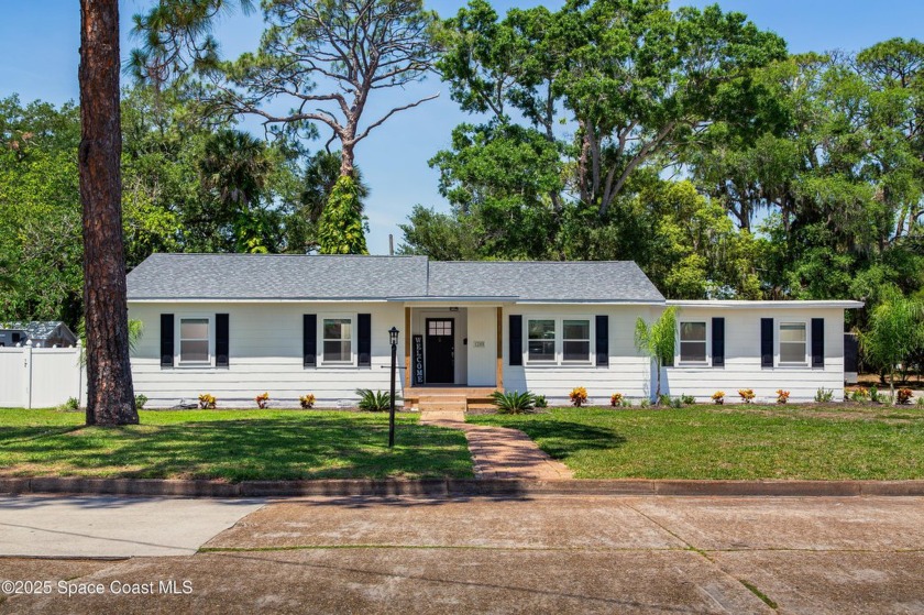Welcome to your dream home - a like-new, fully renovated gem in - Beach Home for sale in Titusville, Florida on Beachhouse.com