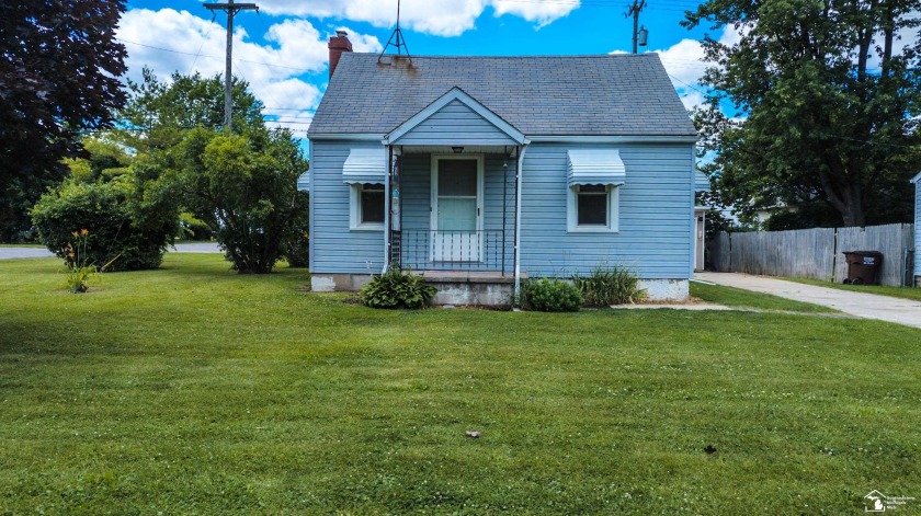 Great location for this cozy 1 1/2 story cape cod. New flooring - Beach Home for sale in Monroe, Michigan on Beachhouse.com