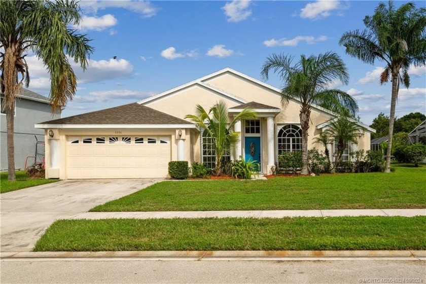 This 4-bedroom, 2-bath home is one you don't want to miss in the - Beach Home for sale in Palm City, Florida on Beachhouse.com