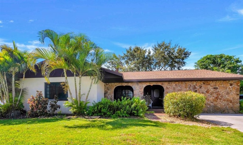 Come see this rustic ranch style house with exterior stone - Beach Home for sale in Englewood, Florida on Beachhouse.com