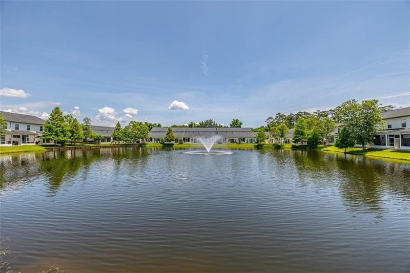 Welcome to this stunning, FULLY FURNISHED townhome that offers - Beach Townhome/Townhouse for sale in Saint Simons, Georgia on Beachhouse.com