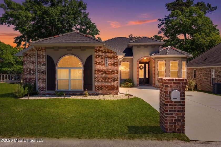 Positioned along the 16th hole of Diamondhead's Cardinal Course - Beach Home for sale in Diamondhead, Mississippi on Beachhouse.com