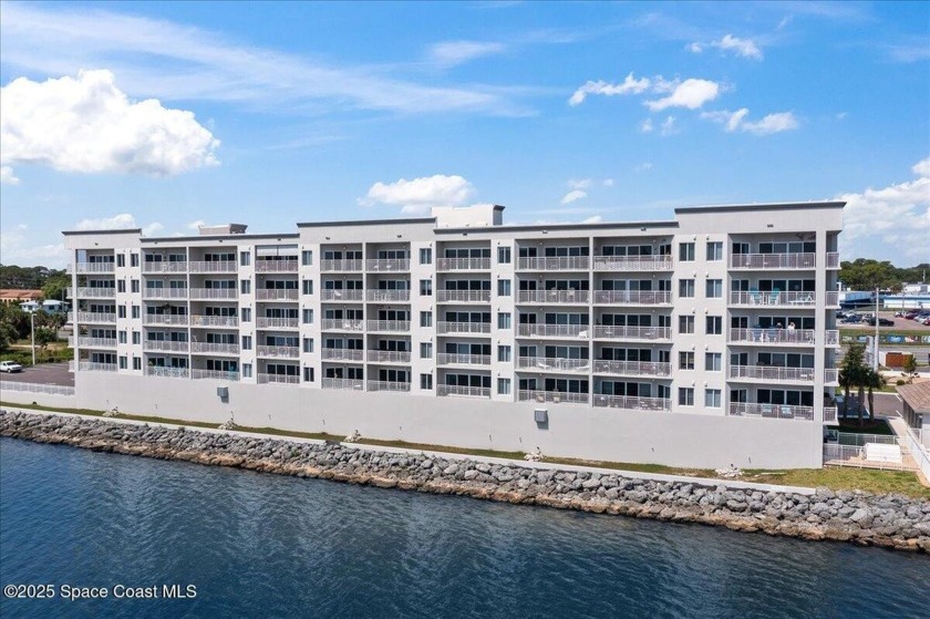 Experience breathtaking, front-row views of the river and rocket - Beach Condo for sale in Titusville, Florida on Beachhouse.com
