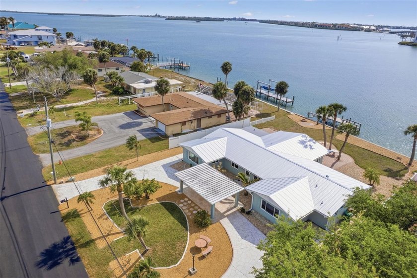 Waterfront living with DIRECT BAY ACCESS and breathtaking sunset - Beach Home for sale in Englewood, Florida on Beachhouse.com
