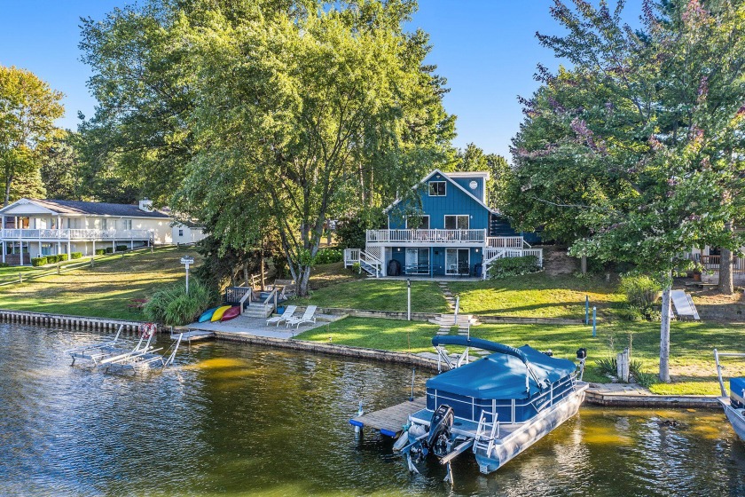 Seize the opportunity to finally get on Upper Silver Lake. 76 - Beach Home for sale in Mears, Michigan on Beachhouse.com