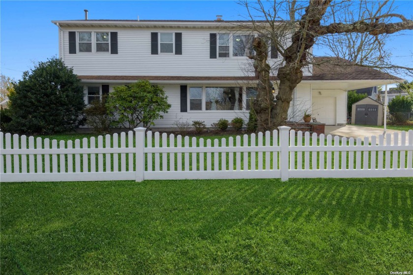 Nestled in the charming community of South Amityville, you'll - Beach Home for sale in Amityville, New York on Beachhouse.com