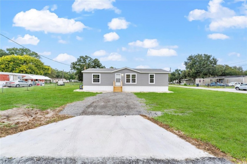 2463 Wildwood Drive is located in a close-knit community with a - Beach Home for sale in Mims, Florida on Beachhouse.com