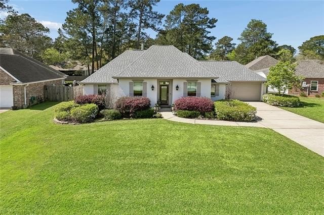 Meticulously maintained and extensively upgraded, this - Beach Home for sale in Mandeville, Louisiana on Beachhouse.com