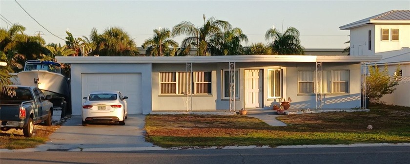 Newly remodeled, this home situated across the street from the - Beach Home for sale in ST Pete Beach, Florida on Beachhouse.com