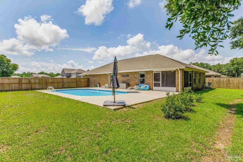 This Extraordinary Pool home offers 4-bed, 2-bath in the - Beach Home for sale in Pace, Florida on Beachhouse.com