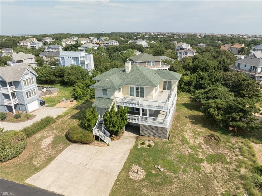 Discover the perfect beachside retreat with this spacious - Beach Home for sale in Kitty Hawk, North Carolina on Beachhouse.com