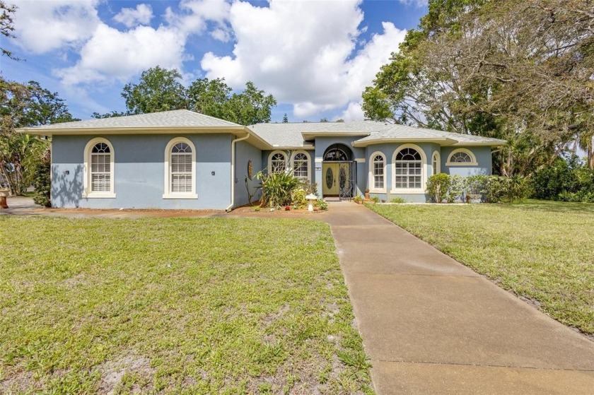 Welcome to this thoughtfully designed custom-built Mark Cahill - Beach Home for sale in Sarasota, Florida on Beachhouse.com