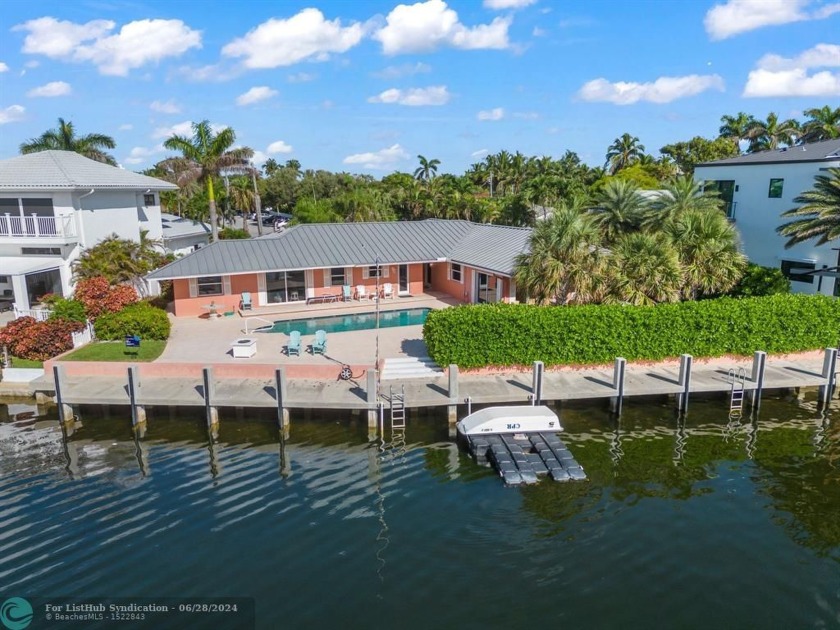 This oversized point lot is perfectly situated on Lake Placid - Beach Home for sale in Lighthouse Point, Florida on Beachhouse.com