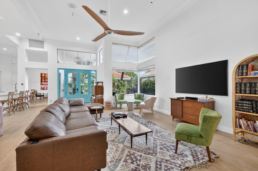 Welcome to this beautiful courtyard home in Boca Grove. Situated - Beach Home for sale in Boca Raton, Florida on Beachhouse.com