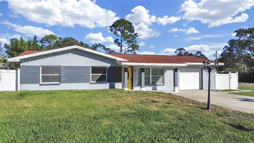 Beautifully Updated Pool Home with No HOA or Flood Zone! This - Beach Home for sale in Clearwater, Florida on Beachhouse.com