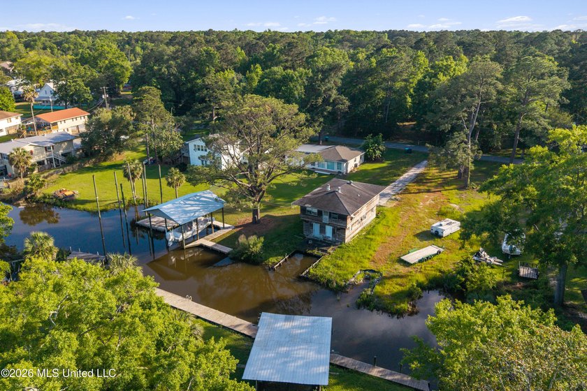 Incredible waterfront opportunity in Driftwood Park! This - Beach Home for sale in Gautier, Mississippi on Beachhouse.com
