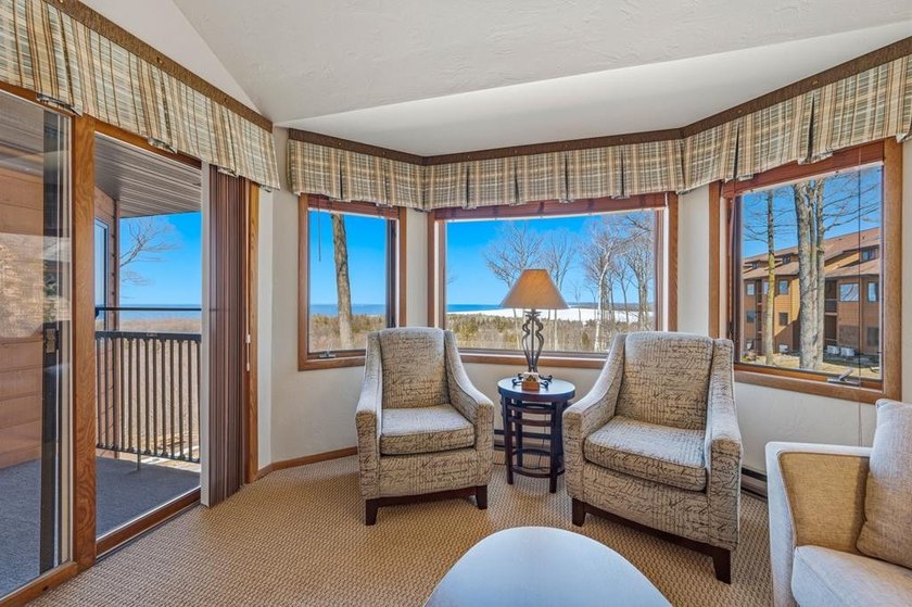 Enjoy stunning WATER VIEWS from this 2-bedroom, 2-bath unit in - Beach Condo for sale in Egg Harbor, Wisconsin on Beachhouse.com