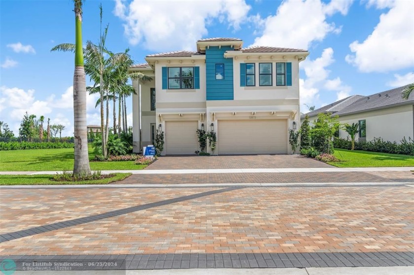 Experience luxury living at its finest in this exquisite new - Beach Home for sale in Palm Beach Gardens, Florida on Beachhouse.com