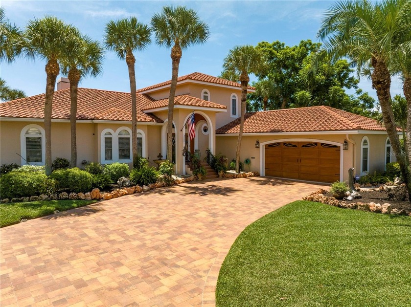 WELCOME TO PARADISE SAYS THIS WATERFRONT BEAUTY IN THE GATED & - Beach Home for sale in St. Petersburg, Florida on Beachhouse.com
